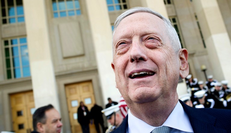 Former Secretary of Defense Jim Mattis speaks with reporters at the Pentagon.