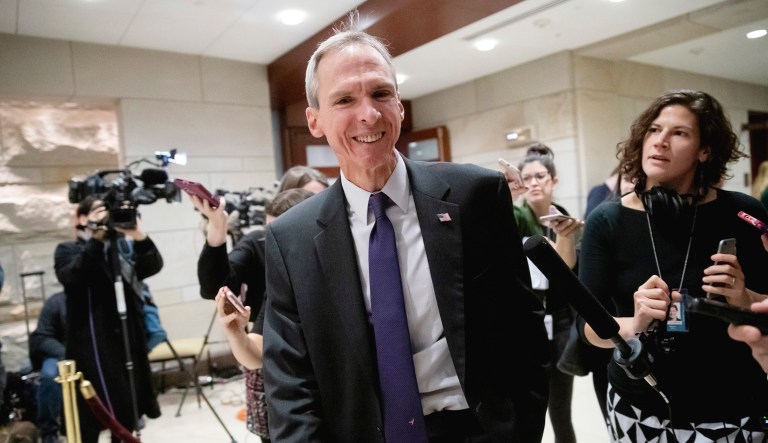Rep. Dan Lipinski, D-Ill., is met by reporters.