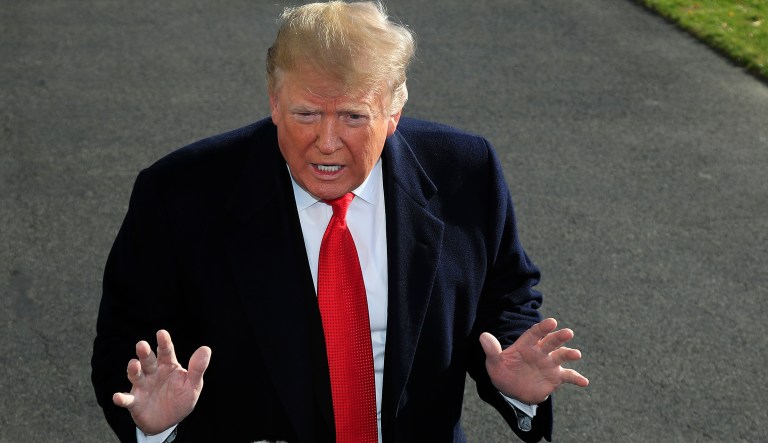 President Donald Trump speaks to reporters on the South Lawn before leaving the White House in Washington, Thursday, Nov. 29, 2018 to attend the G20 Summit in Buenos Aires, Argentina.