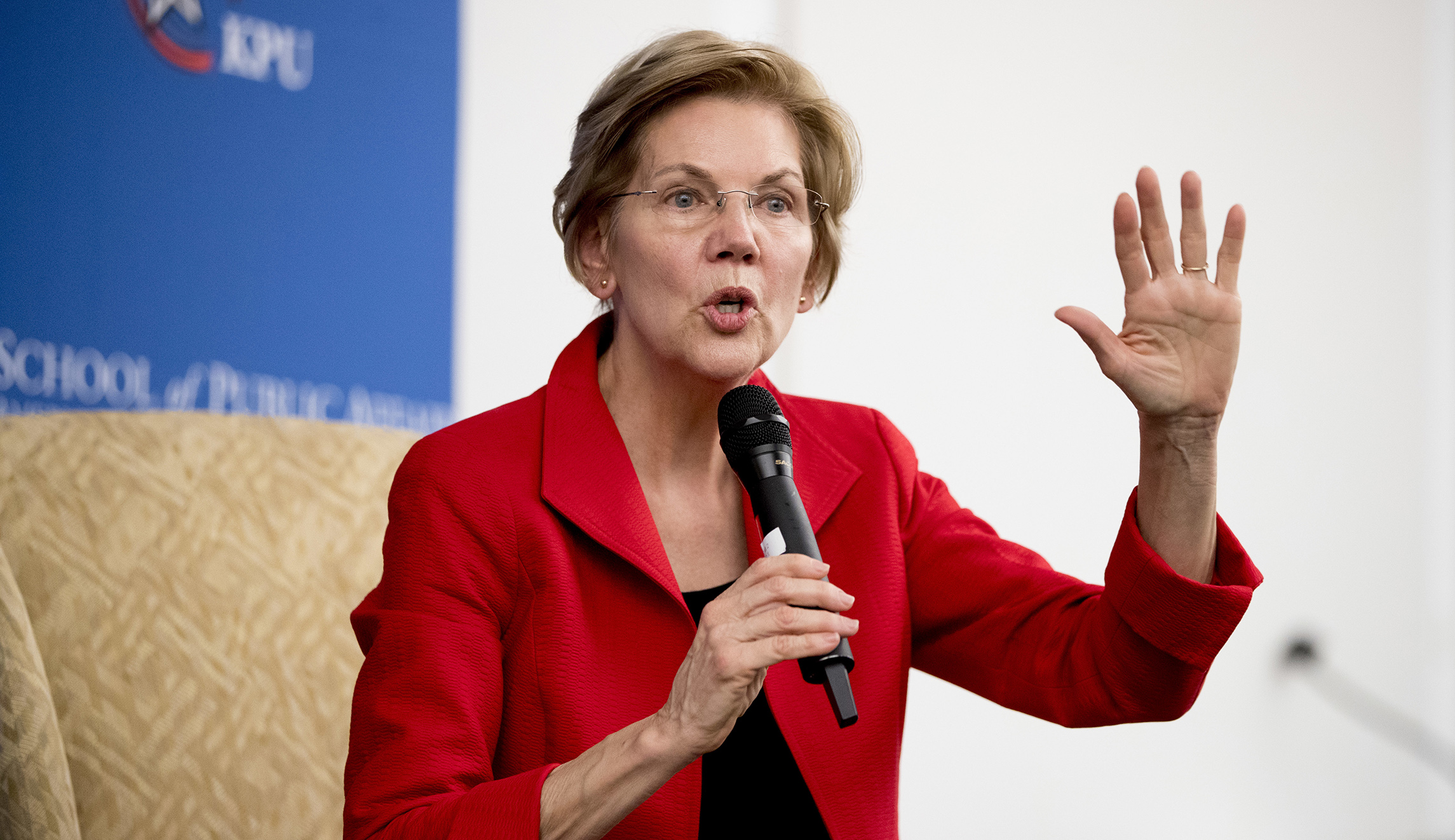 Elizabeth Warren links herself to John F. Kennedy in campaign-style speech