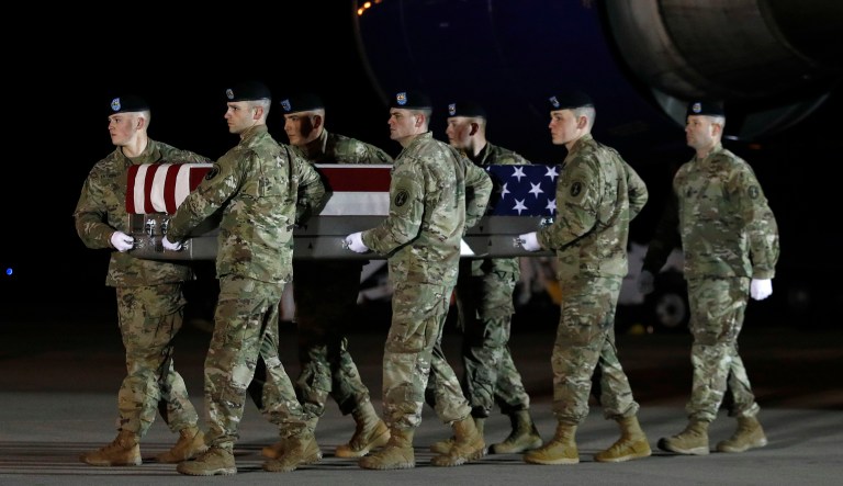 A U.S. Army carry team moves a transfer case containing the remains of Capt. Andrew P. Ross, Friday, Nov. 30, 2018, at Dover Air Force Base, Del. According to the Department of Defense, Ross, 29, of Lexington, Va., was killed Nov. 27, 2018, by a roadside bomb in Andar, Ghazni Province, Afghanistan.
