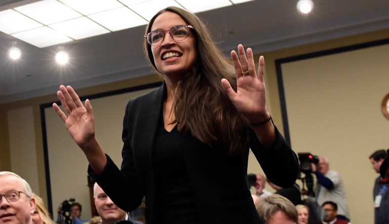 Rep.-elect Alexandria Ocasio-Cortez, D-N.Y., walks up to draw her number during the Member-elect room lottery draw on Capitol Hill in Washington, Friday, Nov. 30, 2018. Ocasio-Cortez drew 40 out of 85, which determines the order in which she gets to select her new Capitol Hill office.
