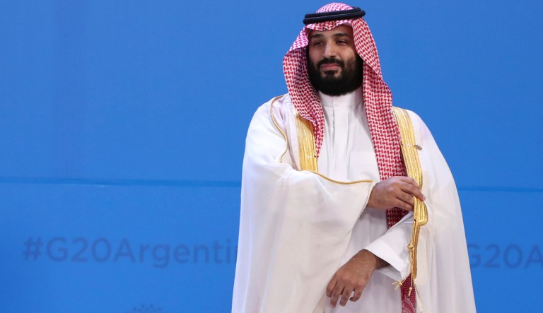 Saudi Arabia's Crown Prince Mohammed bin Salman waits for the group photo with world leaders at the start of the G20 summit in Buenos Aires, Argentina, Friday, Nov. 30, 2018.
