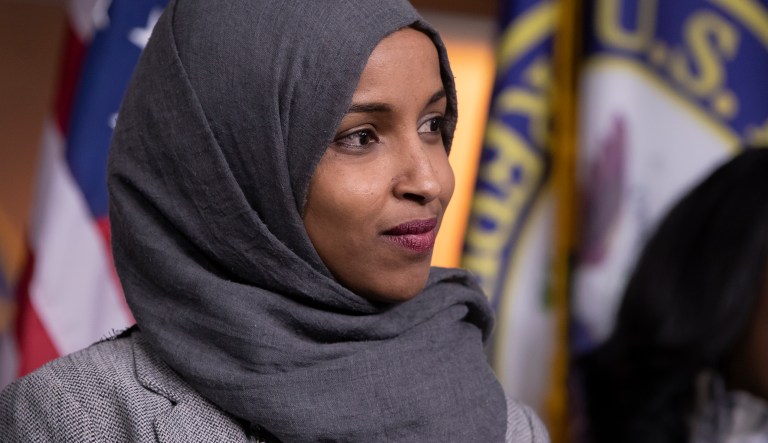 Rep. Ilhan Omar, D-Minn., joins House Democratic Leader Nancy Pelosi of California and newly-elected members at a news conference to discuss their priorities when they assume the majority in the 116th Congress in January, at the Capitol in Washington, Friday, Nov. 30, 2018. 