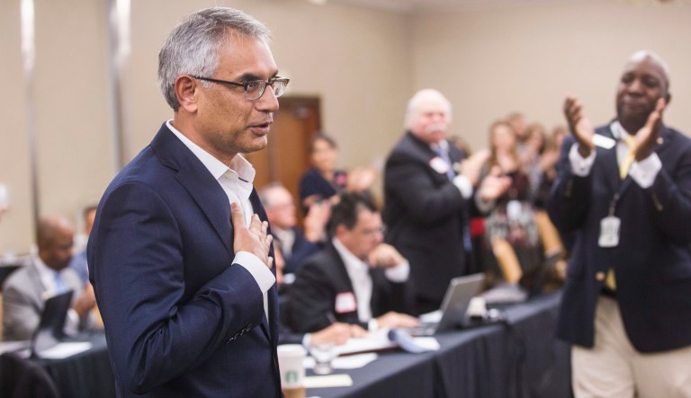 Dr. Shahid Shafi, speaks before members of the State Republican Executive Committee, following a vote in favor of resolution that opposes an effort by the Tarrant County Republican Party (TCRP) to remove him as vice chair because of his religion, during the committee's quarterly meeting on Saturday, Dec. 1, 2018, in Austin. Email exchanges involving county Republican leaders in Texas reveal efforts to remove Shafi, a party vice chairman because he's Muslim.  