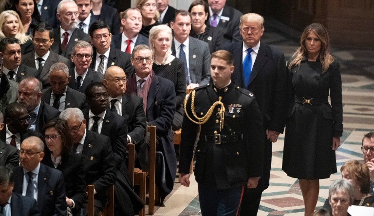 President Trump and first lady Melania Trump arrive for the State Funeral for former President George H.W. Bush at the Washington National Cathedral in Washington, Wednesday, Dec. 5, 2018. 