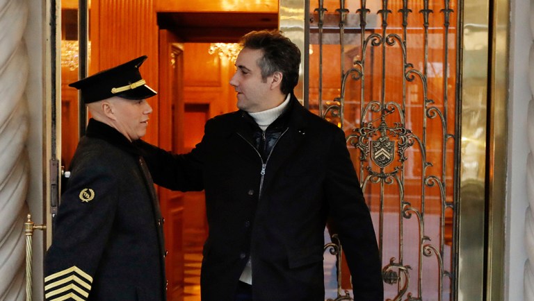Michael Cohen leaves his apartment building on New York's Park Avenue.
