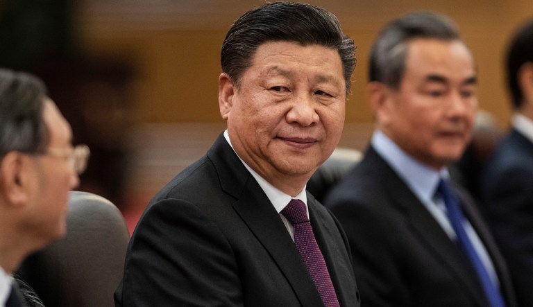 China's President Xi Jinping, center, meets German President Frank-Walter Steinmeier at the Great Hall of the People in Beijing Monday, Dec. 10, 2018.