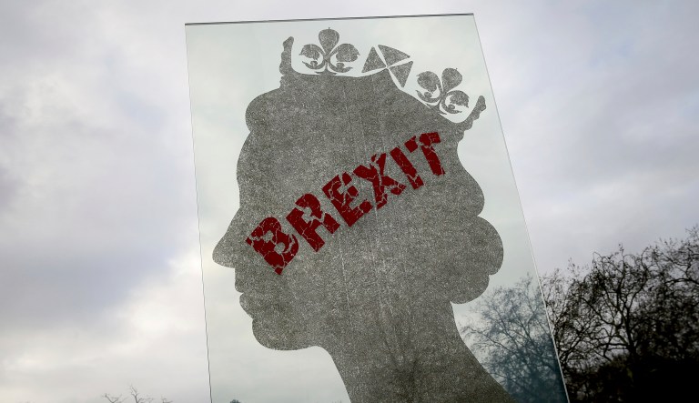 A view of a sculpture by London based Italian artist Matt Marga "One Million Queen" which depicts a profile of Britain's Queen Elizabeth II in London, Monday, Dec. 10, 2018. The sculpture has been defaced with Brexit graffiti.
