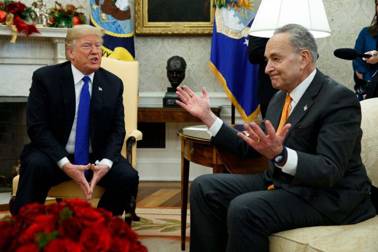 President Trump talks with Senate Minority Leader Chuck Schumer, D-N.Y., during a meeting in the Oval Office of the White House on Dec. 11, 2018, in Washington.