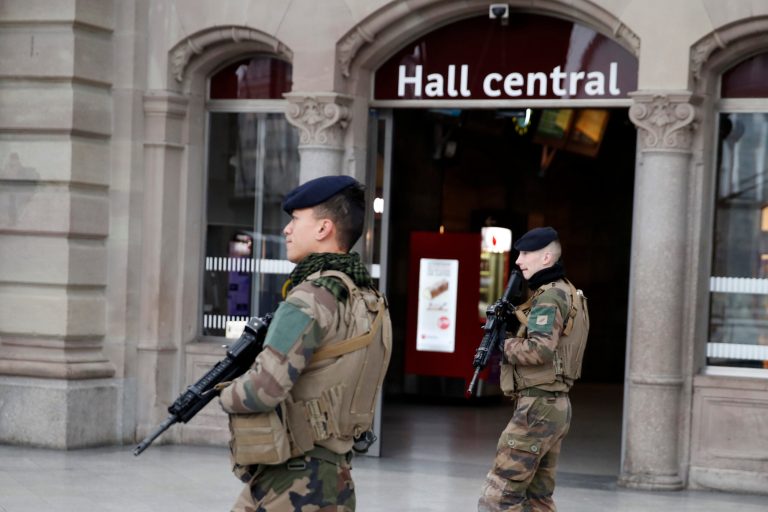 French soldiers patrol in the railway station of the city of Strasbourg following a shooting, eastern France, Wednesday, Dec. 12, 2018. A man who had been flagged as a possible extremist sprayed gunfire near the city of Strasbourg's famous Christmas market Tuesday, killing three people, wounding 12 and sparking a massive manhunt. France immediately raised its terror alert level. 