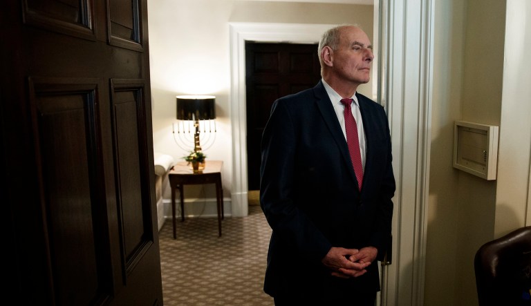White House chief of staff John Kelly listens as President Trump speaks during a meeting with newly elected governors in the Cabinet Room of the White House, Thursday, Dec. 13, 2018, in Washington. 