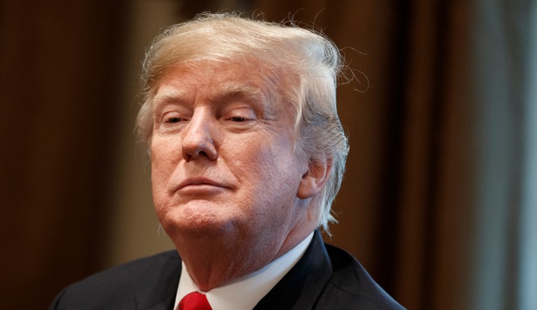 President Trump listens during a meeting with newly elected governors in the Cabinet Room of the White House, Thursday, Dec. 13, 2018, in Washington.