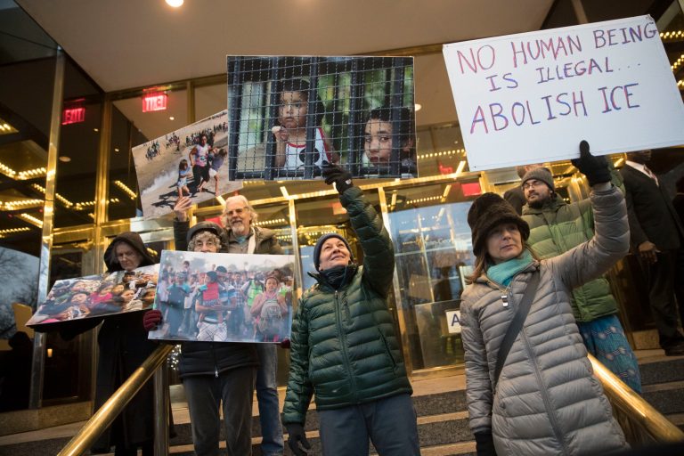 Rise and Resist activist protest President Trump's immigration policies outside the Trump International Hotel and Tower, Thursday, Dec. 13, 2018, in New York.