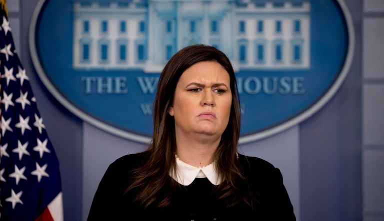 White House press secretary Sarah Sanders listens to a question from a reporter during the daily press briefing at the White House, Tuesday, Dec. 18, 2018, in Washington. Sanders discussed the delayed sentencing for former national security adviser Michael Flynn and other topics.