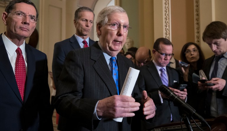 Senate Majority Leader Mitch McConnell, R-Ky., center, joined from left by Sen. John Barrasso, R-Wyo., and Sen. John Thune, R-S.D., speaks to reporters about the possibility of a partial government shutdown, at the Capitol in Washington, Tuesday, Dec. 18, 2018. Congress and President Donald Trump continue to bicker over his demand that lawmakers fund a wall along the U.S.-Mexico border, pushing the government to the brink of a partial shutdown at midnight Friday. 
