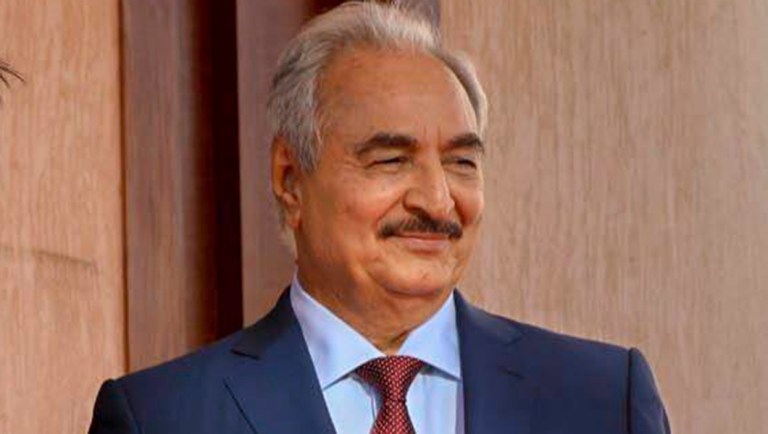 Italian premier Giuseppe Conte poses with head of the Libyan National Army Khalifa Haftar.