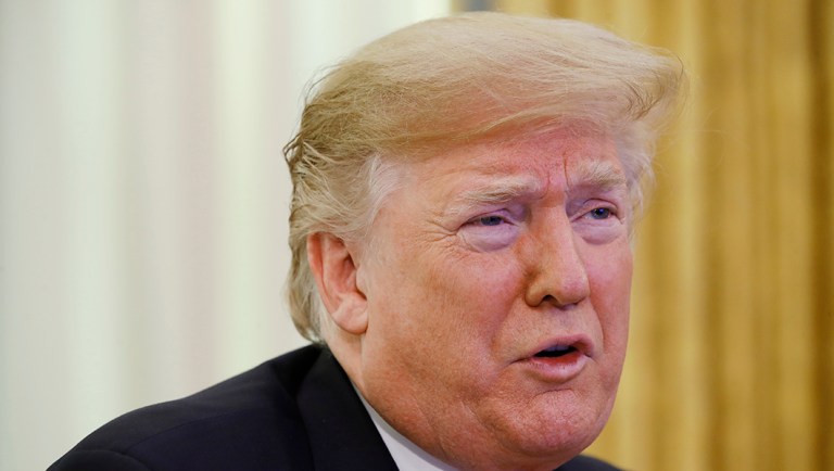 President Trump greets members of the five branches of the military by video conference on Christmas Day.