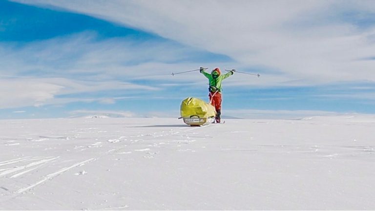 In this photo provided by Colin O'Brady, of Portland., Ore., he poses for a photo while traveling across Antarctica on Wednesday, Dec. 26, 2018. He has become the first person to traverse Antarctica alone without any assistance. O'Brady finished the 932-mile (1,500-kilometer) journey across the continent in 54 days, lugging his supplies on a sled as he skied in bone-chilling temperatures.