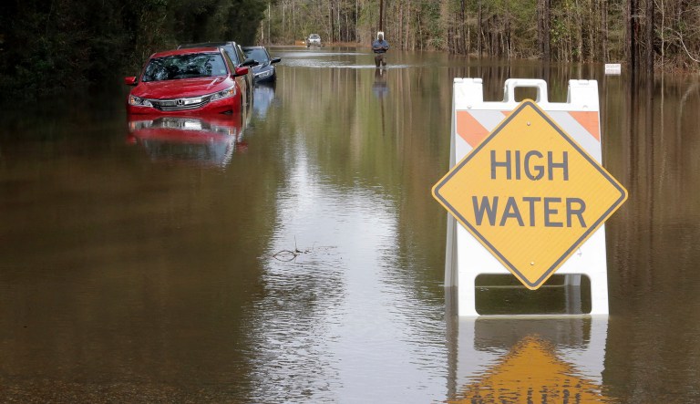 Residents that moved vehicles to higher ground found the vehicles still flooded on Park Lane west of Folsom, La. Friday, Dec. 28, 2018.  