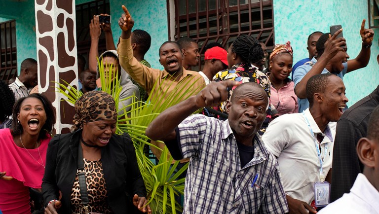Congolese voters who have been waiting at the St. Raphael school in the Limete district of Kinshasa.