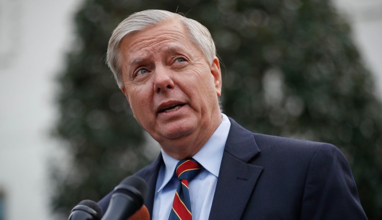 Sen. Lindsey Graham, R-S.C., speaks to members of the media outside the West Wing of the White House in Washington, after his meeting with President Trump, Sunday, Dec. 30, 2018.