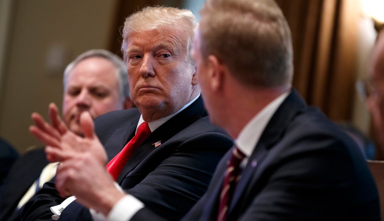 President Trump listens as acting Secretary of Defense Patrick Shanahan speaks during a cabinet meeting at the White House, Wednesday, Jan. 2, 2019, in Washington.