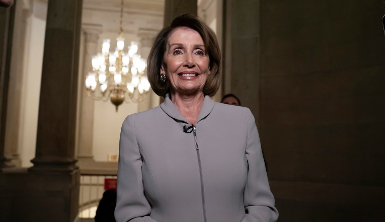 House Democratic Leader Nancy Pelosi of California, who will become speaker of the House on Thursday, walks to her new office at the Capitol during a television interview, in Washington, Wednesday, Jan. 2, 2019.