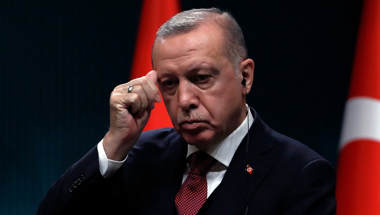Turkey's President Recep Tayyip Erdogan listens to Iraq's President Barham Salih during a joint news conference in Ankara, Turkey.