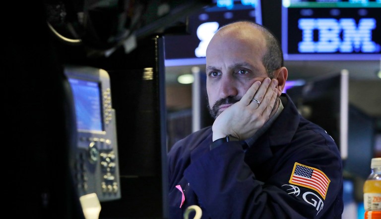 Specialist James Denaro works on the floor of the New York Stock Exchange, Thursday, Jan. 3, 2019.