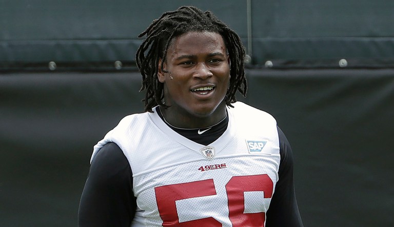 In this May 30, 2018, file photo, then-San Francisco 49ers linebacker Reuben Foster walks on the field during a practice at the team's NFL football training facility in Santa Clara, Calif.  Prosecutors in Florida have decided not to pursue a domestic violence charge against NFL player Reuben Foster more than a month after he was released from the San Francisco 49ers following his arrest. Prosecutors in Tampa filed a notice of termination of prosecution on Wednesday, Jan. 2, 2019.