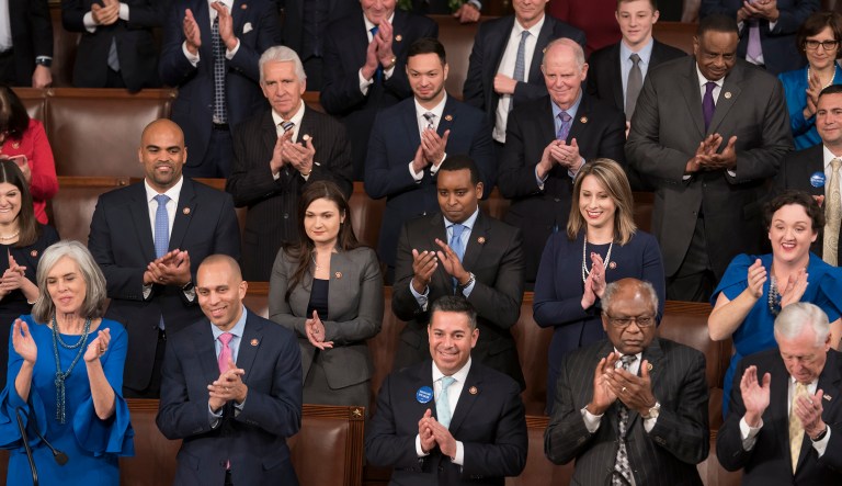 Members of the new House Democratic leadership, front row from left, Rep. Katherine Clark, D-Mass., the vice chair of the Democratic Caucus, Democratic Caucus Chair Hakeem Jeffries, D-N.Y., Assistant Democratic Leader Ben Ray Lujan, D-N.M., House Majority Whip James Clyburn, D-S.C., and House Majority Leader Steny Hoyer, D-Md., join others in their caucus in applauding Speaker of the House Nancy Pelosi, D-Calif., on the opening day of the 116th Congress.