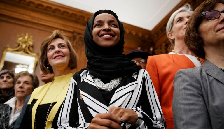 Rep. Ilhan Omar, D-Minn., center, joins other Democrats during a news conference on Capitol Hill in D.C.