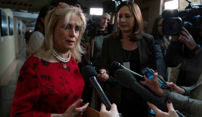 Rep. Debbie Dingell, D-Mich., co-chair of the Democratic Policy and Communications Committee, speaks with reporters at the Capitol in Washington, Friday, Jan. 4, 2019. 