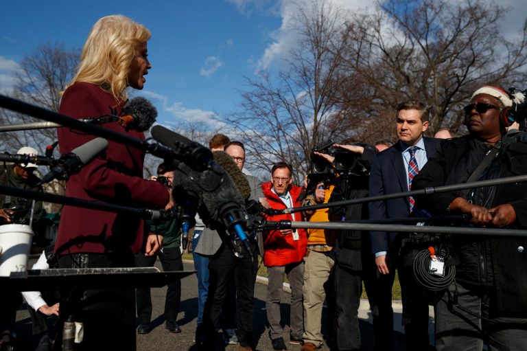 White House senior adviser Kellyanne Conway talks to CNN journalist Jim Acosta during a press gaggle outside the White House, Tuesday, Jan. 8, 2019, in Washington.
