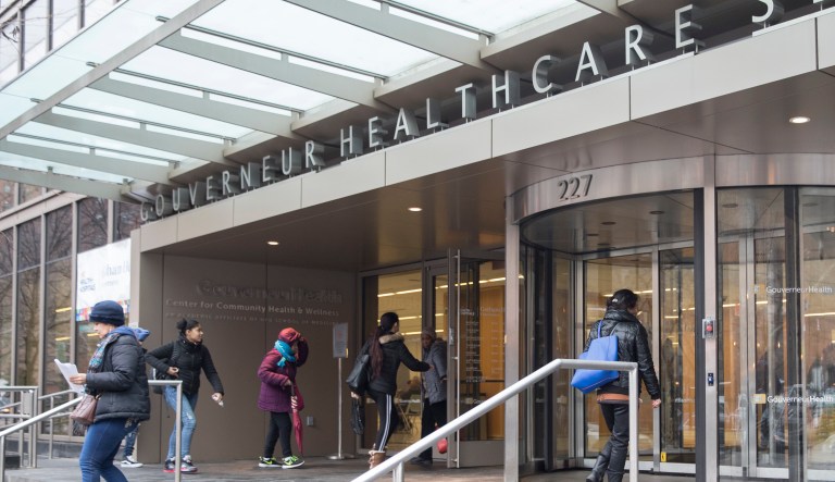 People enter New York City Health Hospitals Gouverneur Health building, Tuesday, Jan. 8, 2019, in New York.