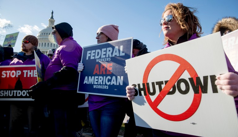 Air Traffic and pilot unions members protest the government shutdown on Capitol Hill in Washington, Thursday, Jan. 10, 2019.