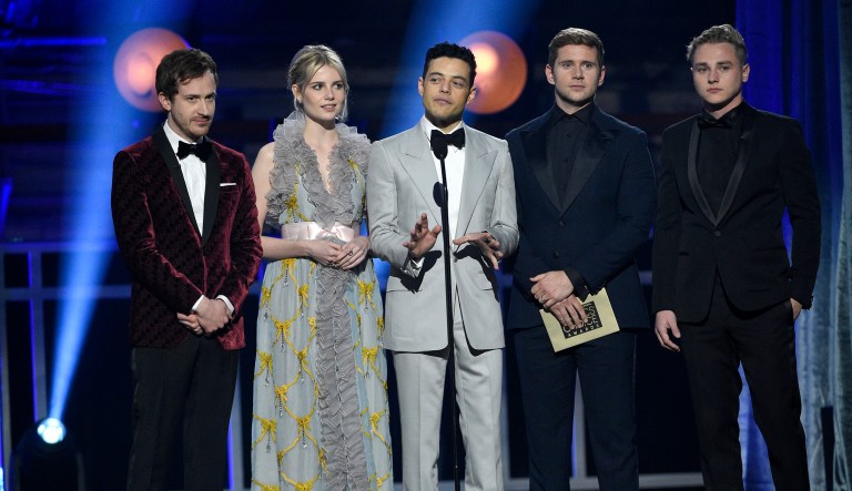 Joe Mazzello, from left, Lucy Boynton, Rami Malek, Allen Leech and Ben Hardy, from the cast of "Bohemian Rhapsody," present the award for best supporting actress at the 24th annual Critics' Choice Awards on Sunday, Jan. 13, 2019, at the Barker Hangar in Santa Monica, Calif. 