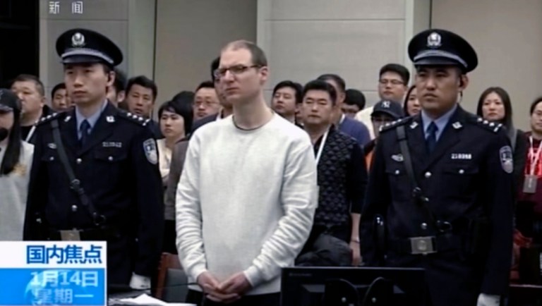 In this image taken from a video footage run by China's CCTV, Canadian Robert Lloyd Schellenberg attends his retrial.
