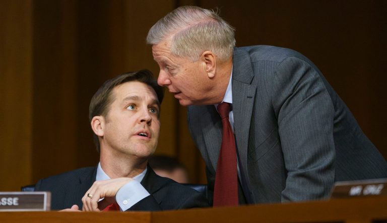 Senate Judiciary Committee Chairman Lindsey Graham, R-S.C., right, speaks with Sen. Ben Sasse, R-Neb., as Attorney General nominee William Barr testifies before the Senate Judiciary Committee on Capitol Hill in Washington, Tuesday, Jan. 15, 2019. 