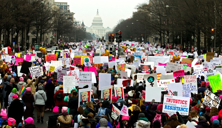Demonstrators march on Pennsylvania Av. during the Women's March in Washington on Saturday, Jan. 19, 2019.