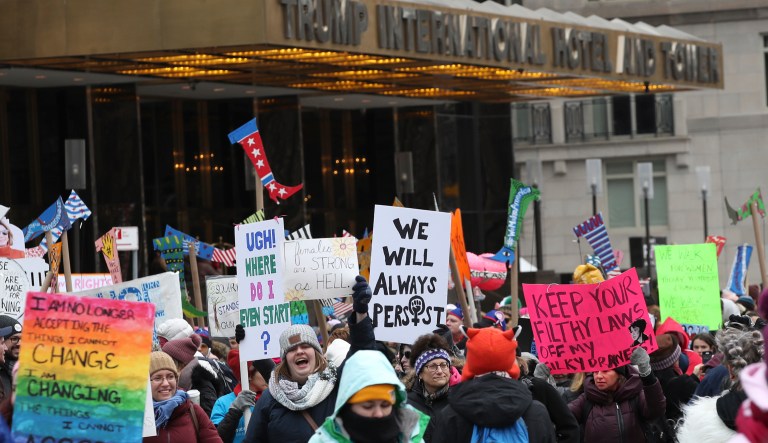 Demonstrators march past the Trump International Hotel and Tower during the Women's March Alliance, Saturday, Jan. 19, 2019, in New York. One procession, a march through midtown Manhattan, is being organized by the Women's March Alliance, a nonprofit group whose leaders are putting on their demonstration for the third straight year. Another event, a downtown Manhattan rally held at roughly the same time Saturday, is being organized by the New York City chapter of Women's March Inc., the group formed to help organize the 2017 demonstration in Washington, D.C.