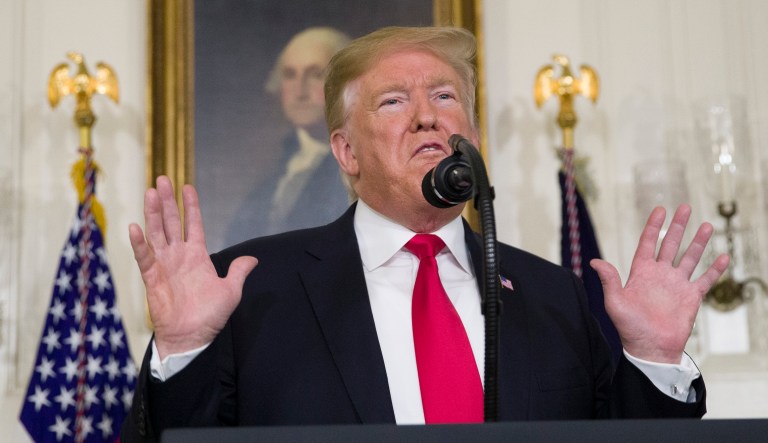 President Trump speaks about the partial government shutdown, immigration, and border security in the Diplomatic Reception Room of the White House, in Washington, Saturday, Jan. 19, 2019.