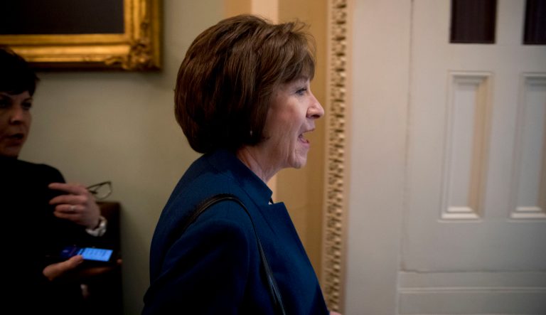 Sen. Susan Collins, R-Maine, speaks to reporters as she walks into a closed-door meeting with Senate Republicans on Capitol Hill in Washington, Friday, Jan. 25, 2019.