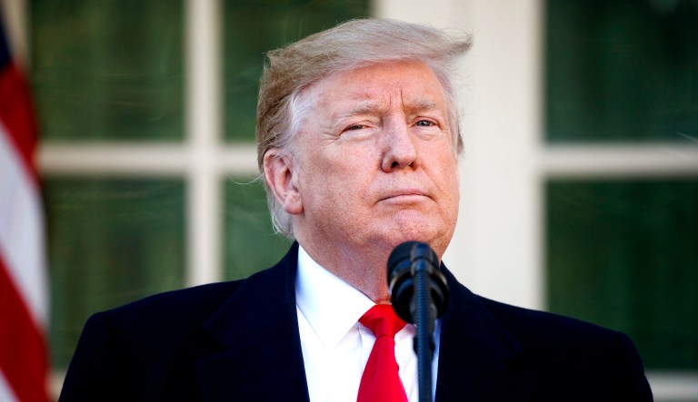 President Trump announces a deal to temporarily reopen the government in the Rose Garden of the White House.