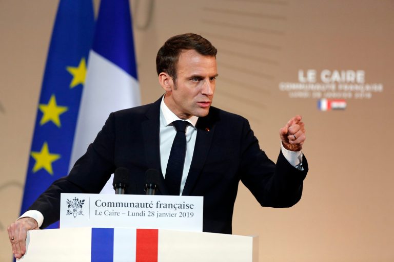 French President Emmanuel Macron talks to members of the French community at the French embassy in Cairo, Egypt, Monday, Jan. 28, 2019. 