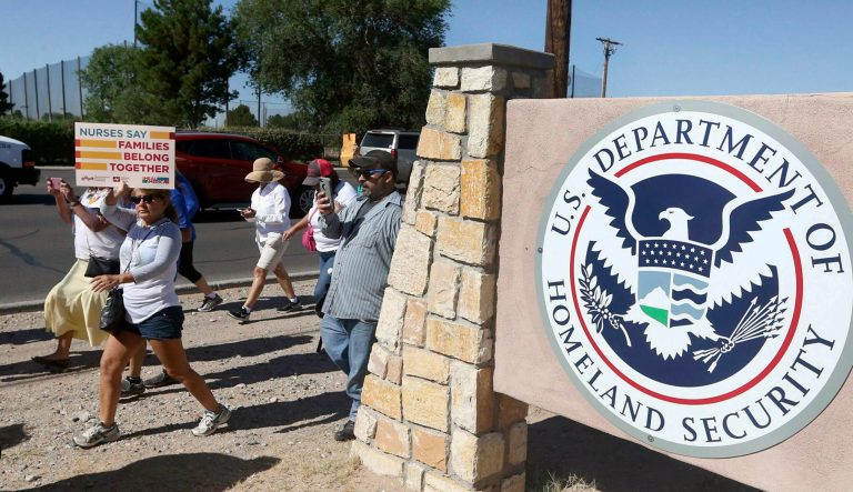 This June 2018 photo shows protesters walking along Montana Avenue outside the El Paso Processing Center, in El Paso, Texas. Federal immigration officials are force feeding some of the immigrants who have been on hunger strike for nearly a month inside the Texas detention facility, The Associated Press has learned. 