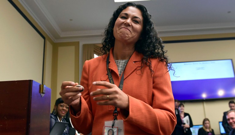 FILE - In this Nov. 30, 2018, file photo, Rep.-elect Xochitl Torres Small, D-N.M., reacts after drawing her number during the member-elect room lottery draw on Capitol Hill in Washington. Torres Small told The Associated Press she doesn't mind not getting as much attention as other freshmen in Congress because she has other goals around border security.
