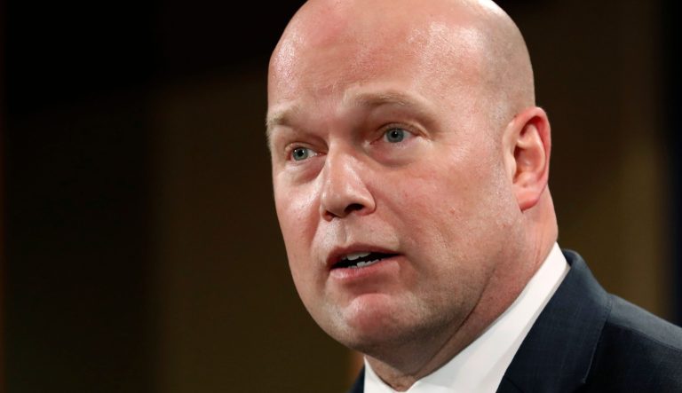 In this Jan. 28, 2019 file photo, acting Attorney General Matt Whitaker announces an indictment on violations including bank and wire fraud at the Justice Department in Washington. 