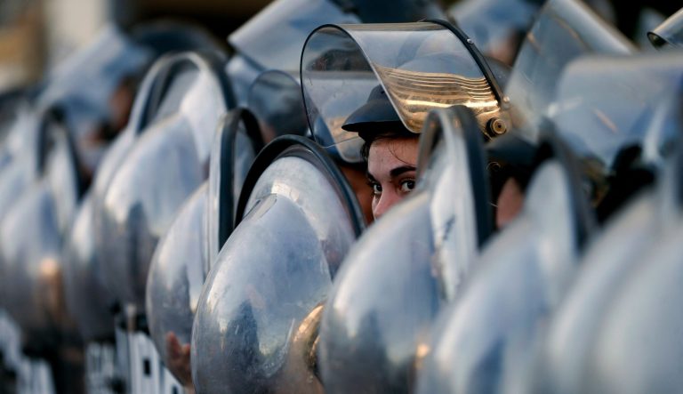 Police block a street that leads to the U.S embassy during a protest against U.S. intervention in Venezuela, in Buenos Aires, Argentina, Tuesday, Feb. 5, 2019. Venezuelan President Nicolas Maduro accuses the United States of trying to orchestrate a coup against him, and that allegation has resonance among many in a region where Washington has a long history of interventions â military and otherwise.